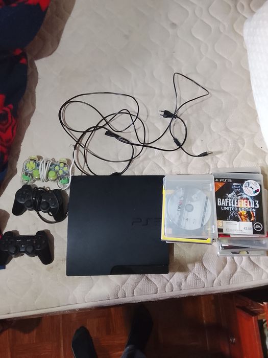 Ps3 com acessórios e jogos