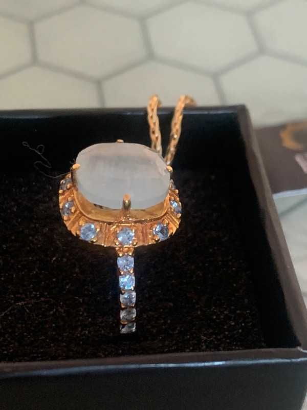 Anel Elite prata e ouro aquamarina com zirconias
