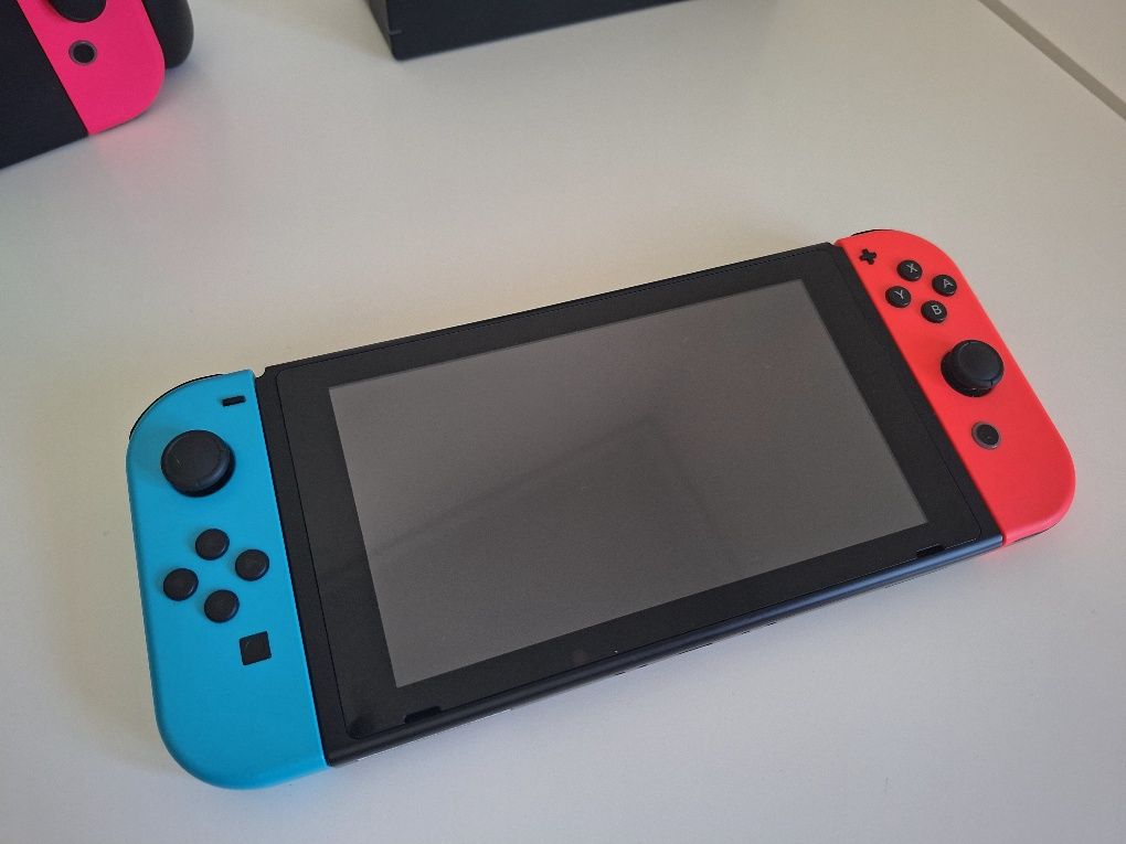 Nintendo switch com acessórios e jogos