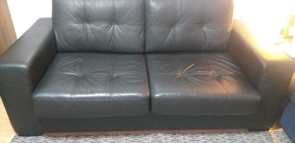 Sofá Cama em couro semi novo