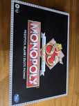Gra planszowa monopoly 85 rocznica przepych blask i złote pionki.
Stan
