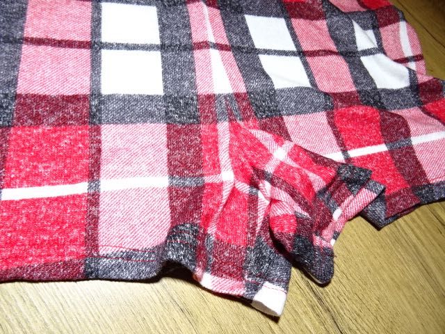 Primark pajac krotki krata plastyczny S