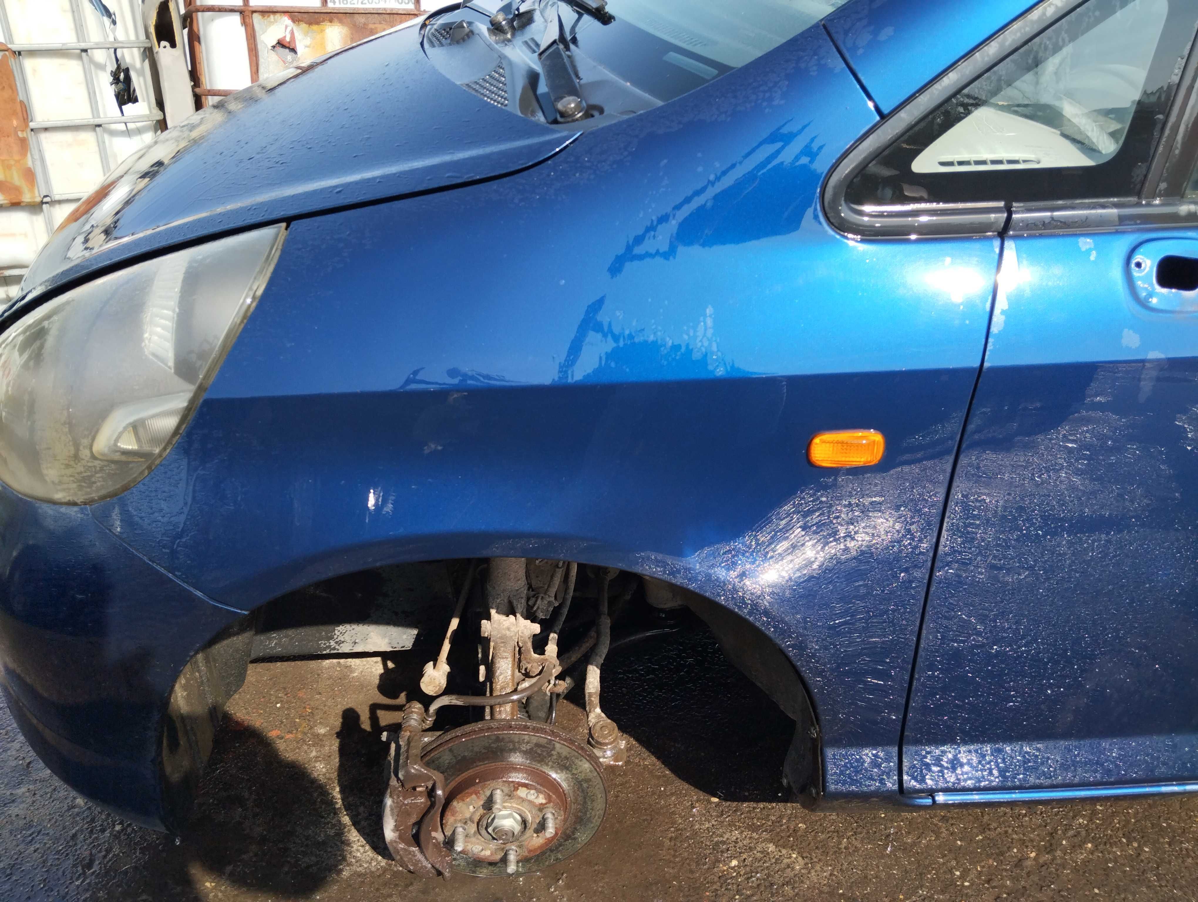 Honda Jazz 1.3i 5D 2002r.Błotnik przedni lewy.