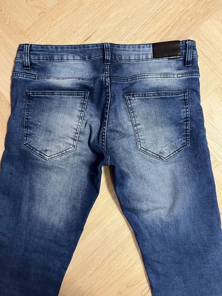 Spodnie męskie jeansowe Reserved rozmiar 31