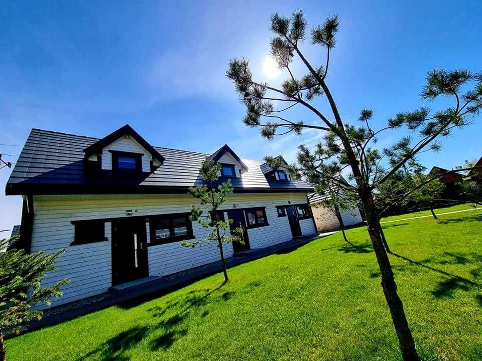 osada jantar domek nad morzem z basenem