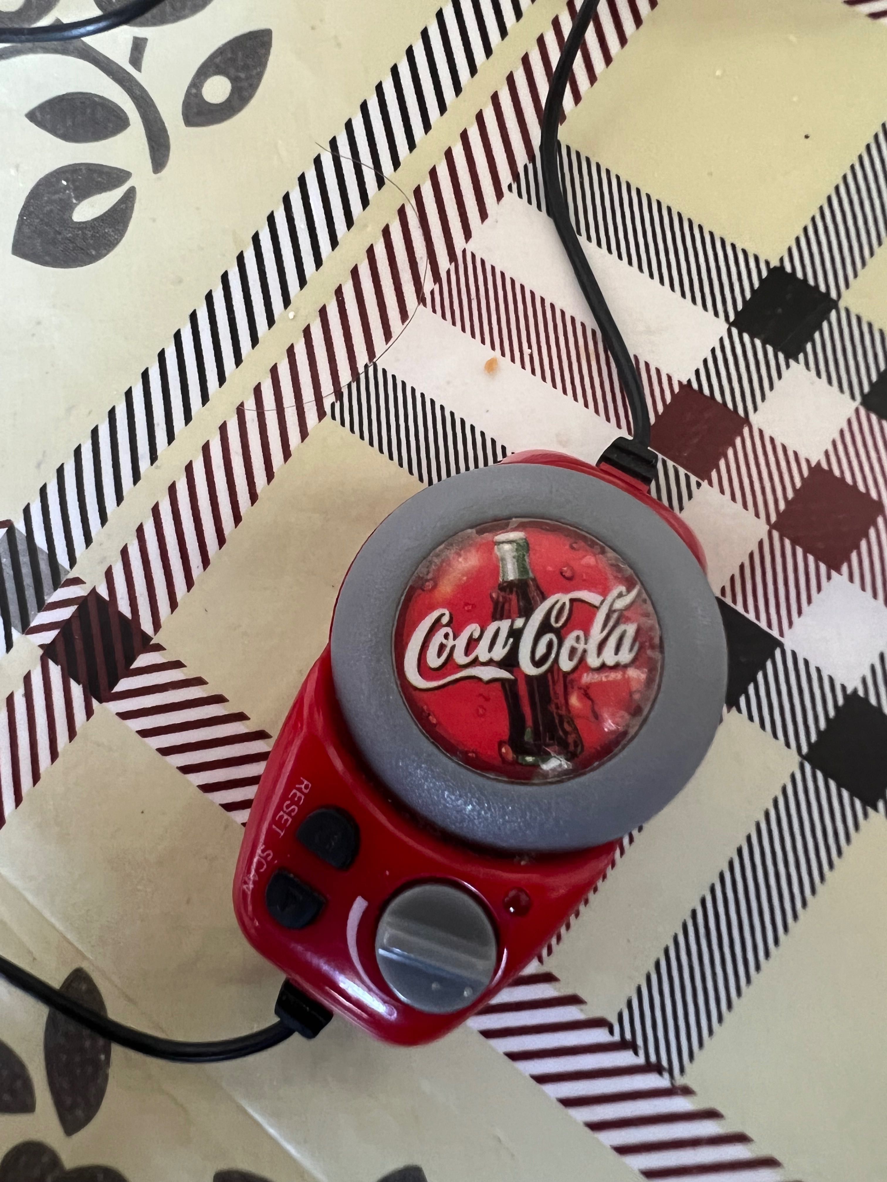 Coca cola radio com auscultadores