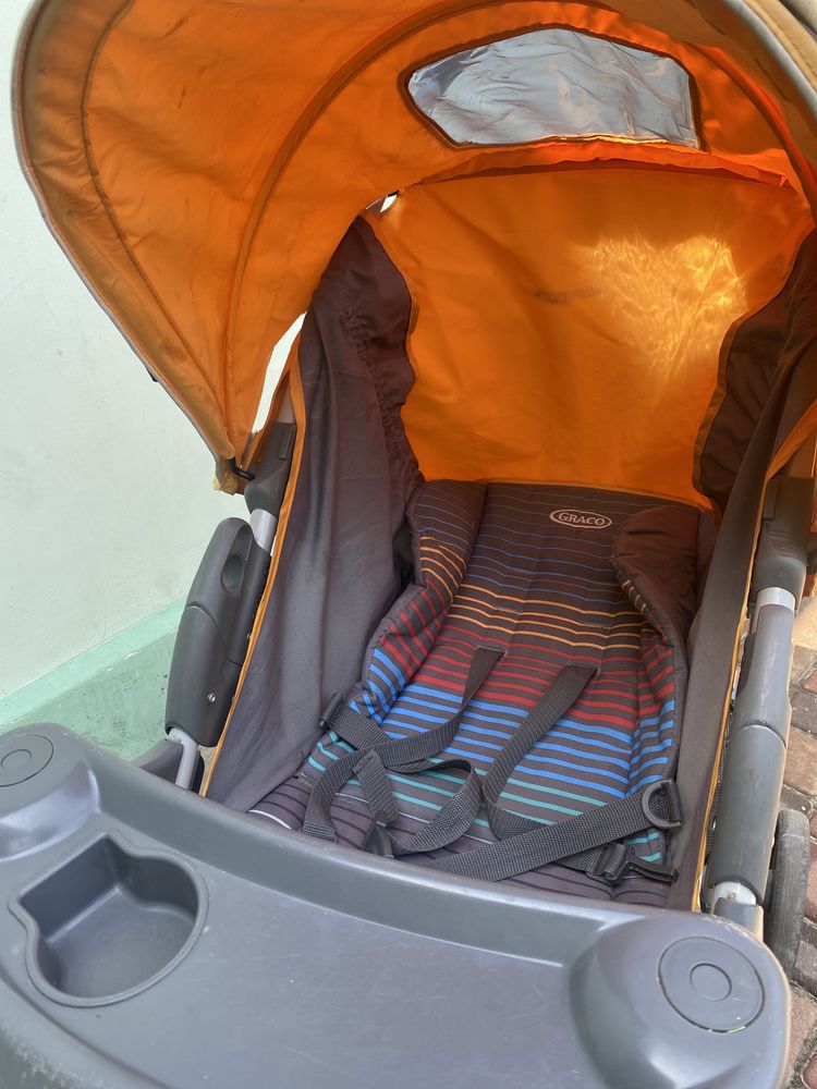 Продам Прогулочную  коляску  Graco Mirage Plus Jaffa Stripe, оранжевый