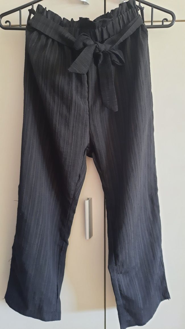 Spodnie  eleganckie 140