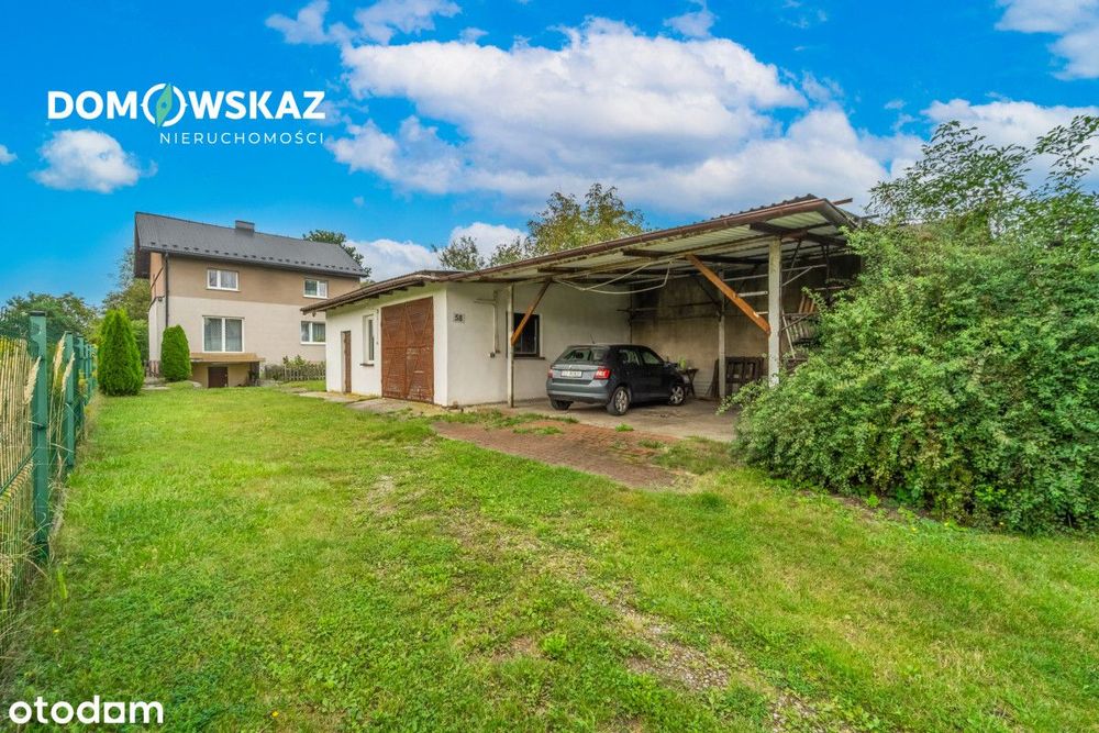 Dom z dużą działką i budynkami gospodarczymi