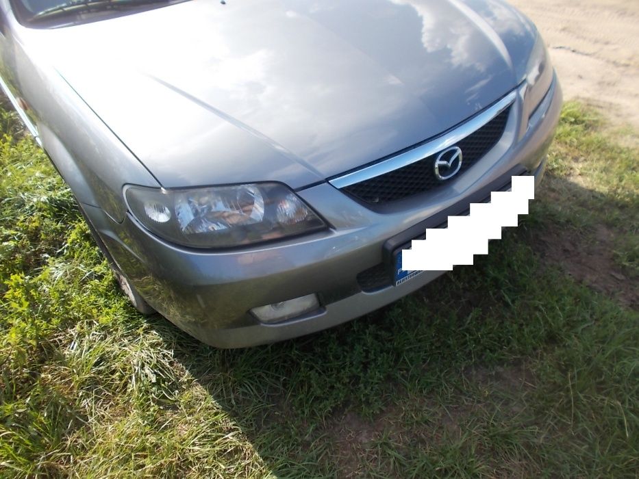 Mazda 323F,hatchback,5 drzwi,2002r.1.6 benzyna,grafit,na części