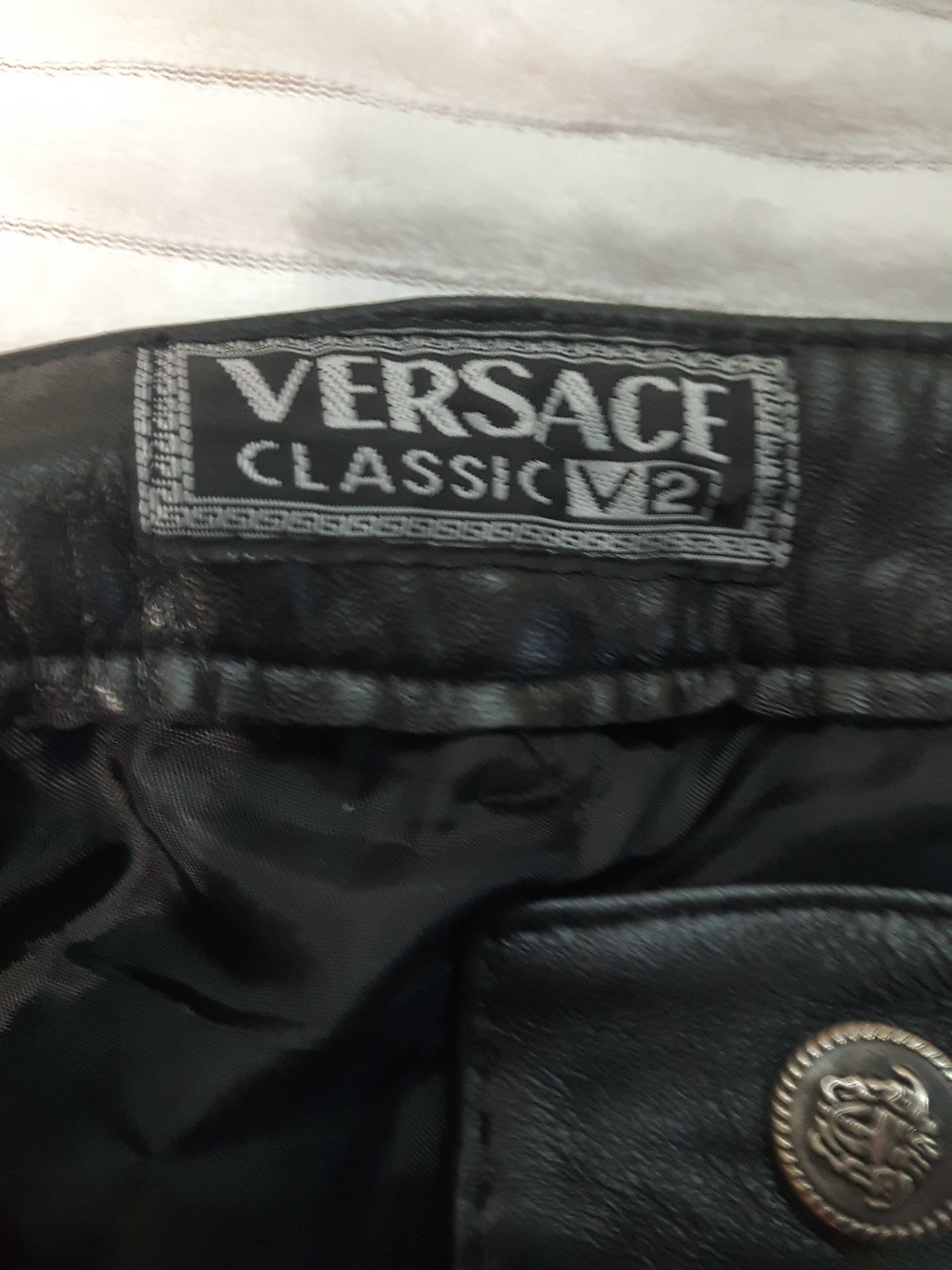 Брюки кожаные женские Versace.