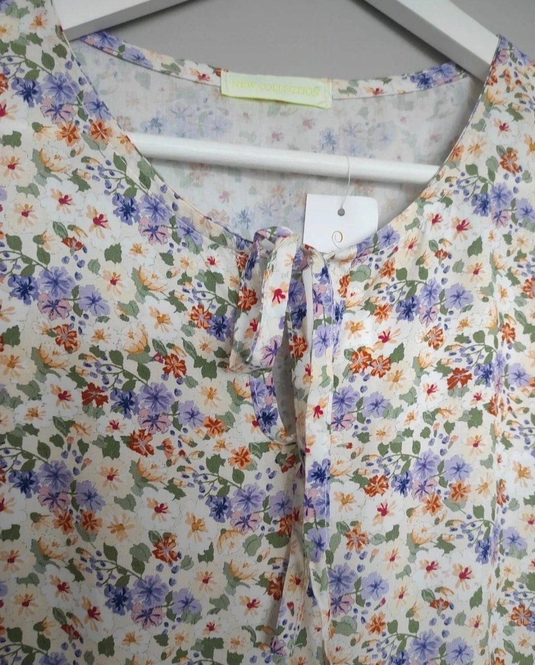 Nowa sukienka w kwiaty , styl babydoll oversize, falbany kwiatuszki