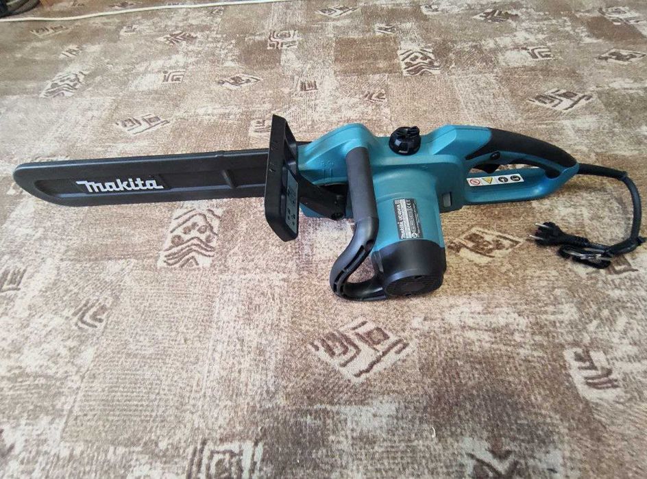 Електропила Makita UC4041A