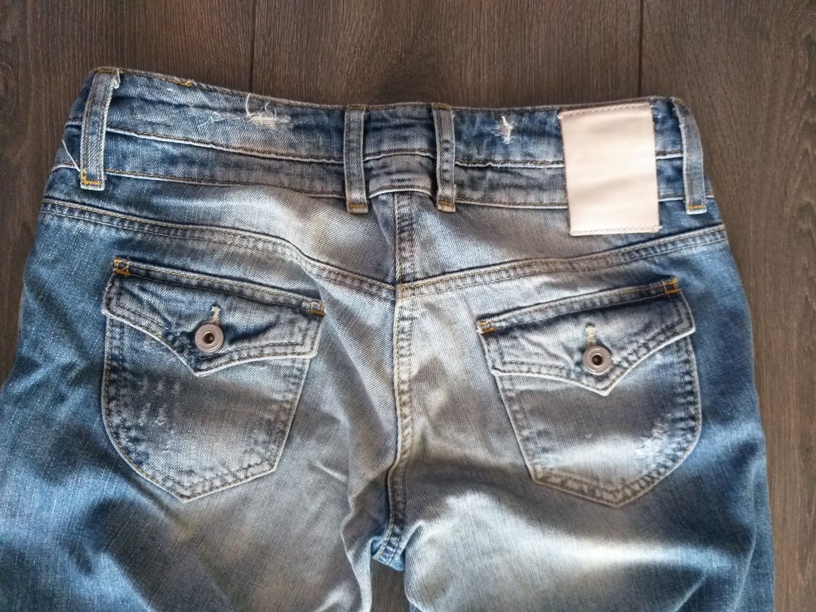 Spodnie River Island jeansy dżinsy przecierane dziury rozdarcia r.  S
