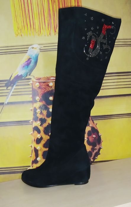 Высокие зимние сапоги