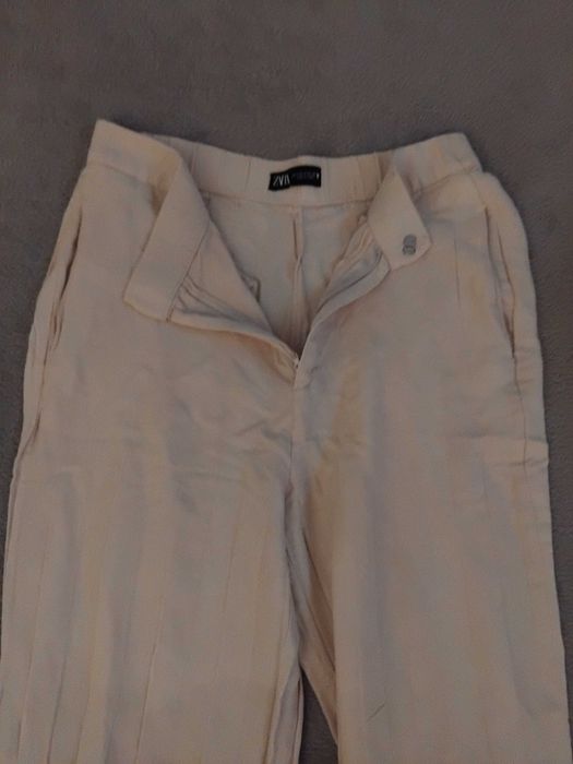 Calças creme justas - Zara