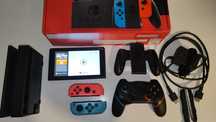 Konsola Nintendo Switch. Pad, nowe joycony, futerał, stacja