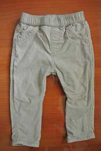 Бежевые узкие штаны на резинке на мальчика или девочку george 9-12 М