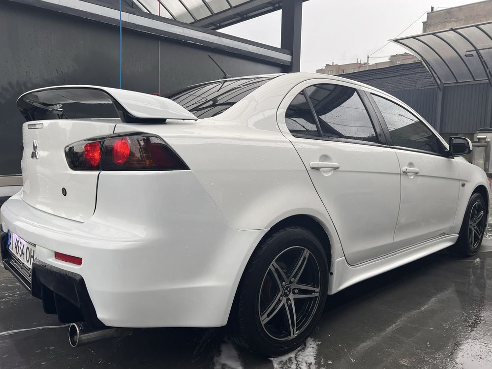 Mitsubishi Lancer 2012 • 1.6 МКПП ГАЗ/БЕНЗИН