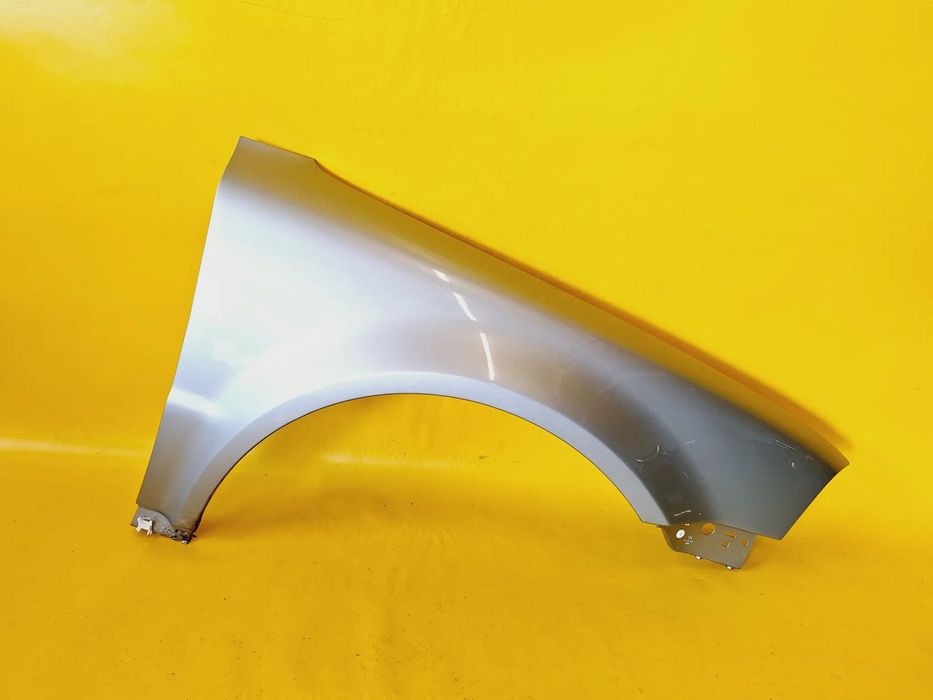 BŁOTNIK PRAWY PRZÓD PRZEDNI VW PASSAT B5 FL LAK: LA7S 00-05 NR662