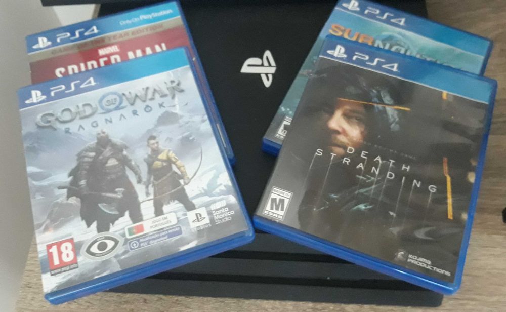 PS4 PRO semi-novo + 7 jogos(opcional)