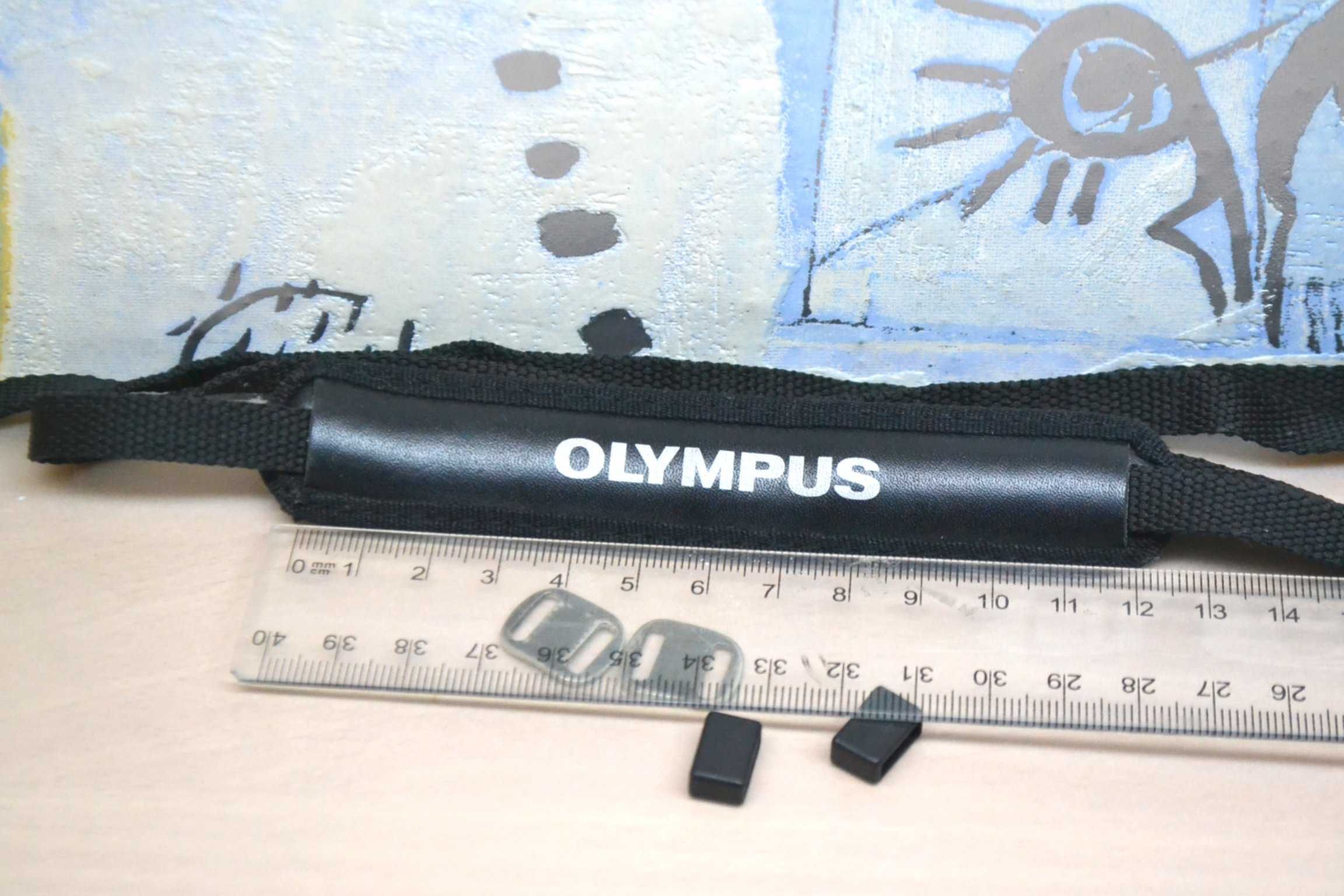 oryginalny pasek OLYMPUS do aparatu lustrzanki uni oryginał ładny