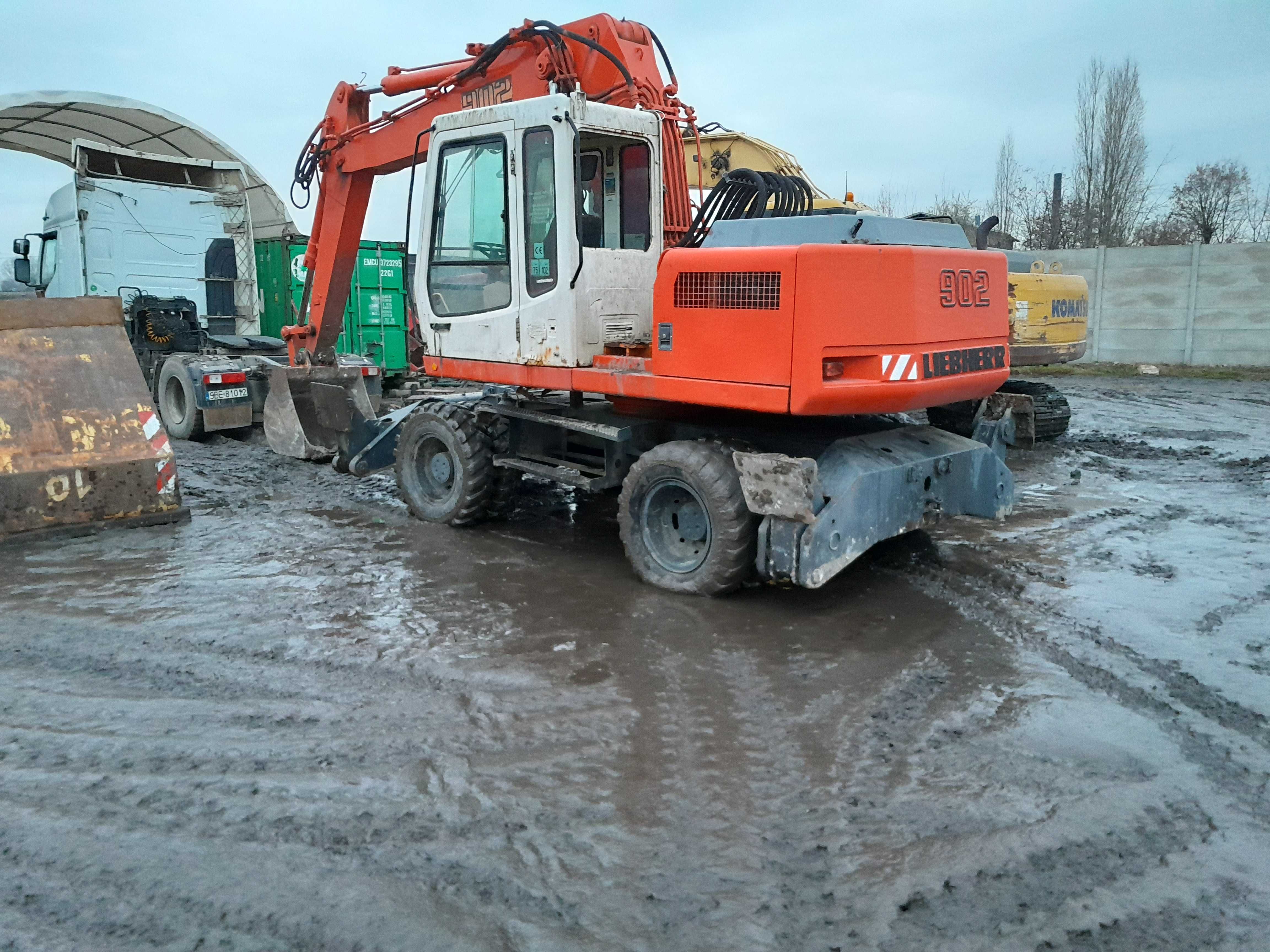 usługi koparkami koparką koparko-ładowarką koparka prace ziemne wykopy