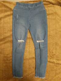 Spodnie jeansowe dziewczęce z dziurami jeansy elastyczne niebieskie 10