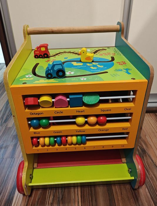 Pchacz drewniany na kółkach