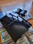 Vendo consola PS3 150GB  + 2 comandos originais