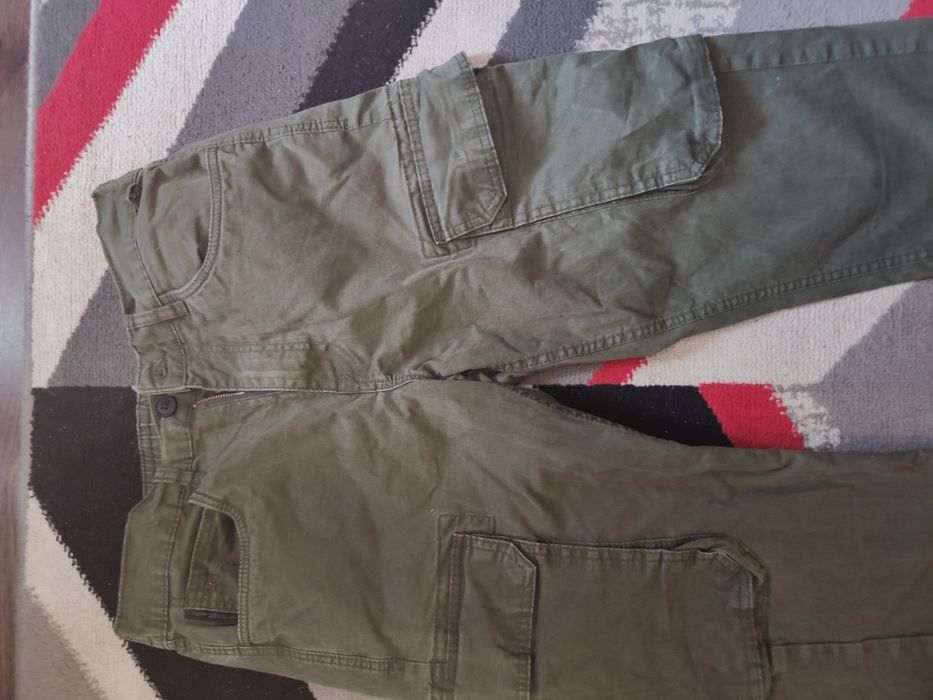 Spodnie męskie młodzieżowe zielone khaki bojówki Cropp rozmiar 34L