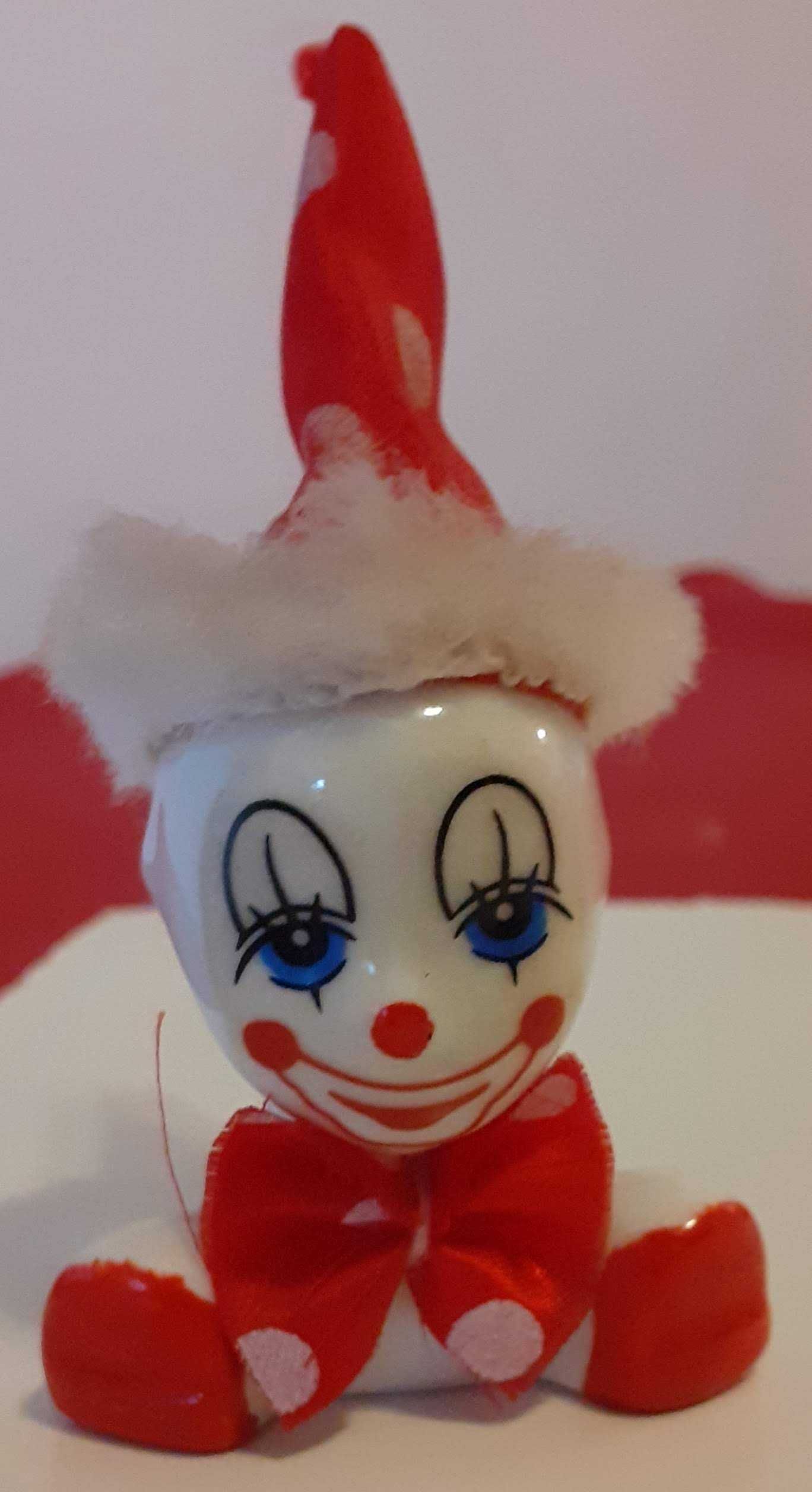 4 Miniaturas Palhaços em porcelana