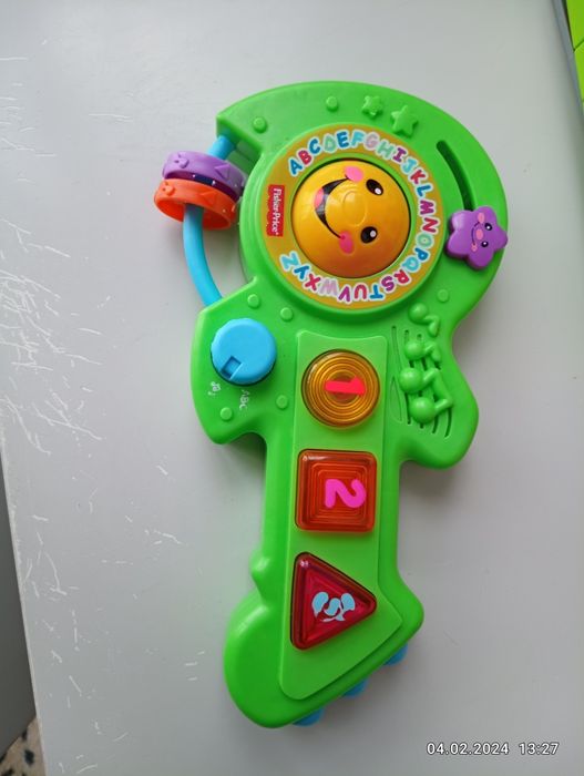 Розвиваюча іграшка музична гітара Fisher Price