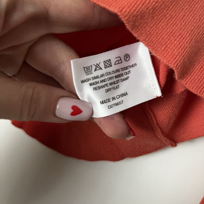 pomarańczowy krótki sweterek sweter crop top linea
