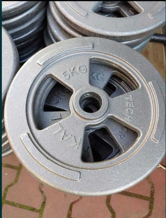 Obciążenie żeliwne kal tech  5 i 10kg fi 33