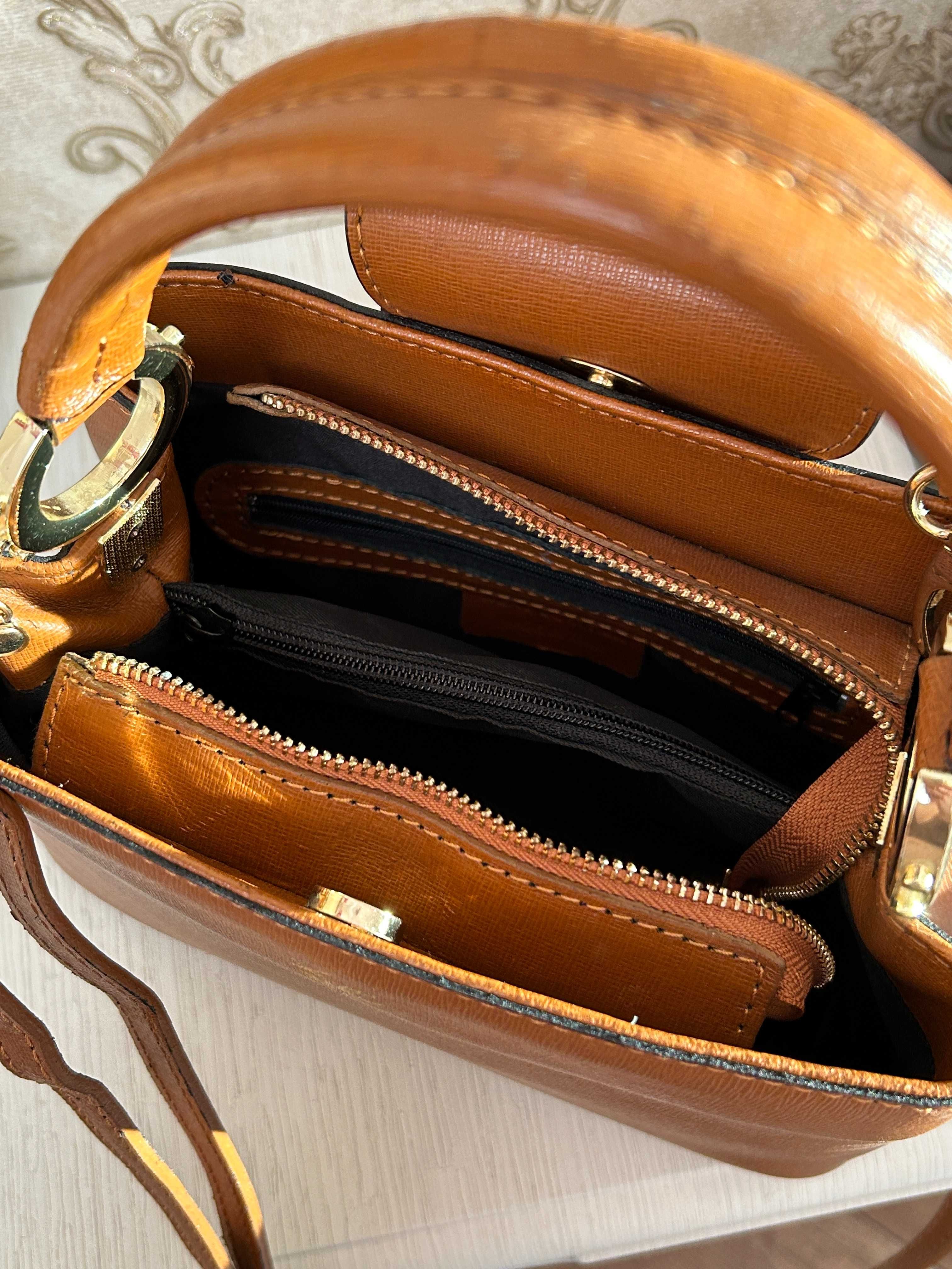 Продам коричневу сумочку з Італії