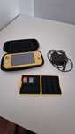 Troco Nintendo Switch Lite (amarela) + acessórios + 2 jogos