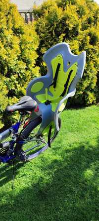 Fotelik rowerowy marki BTwin, montowany do siodełka roweru