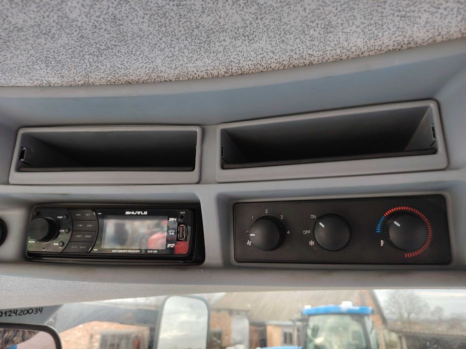 трактор New Holland 7070