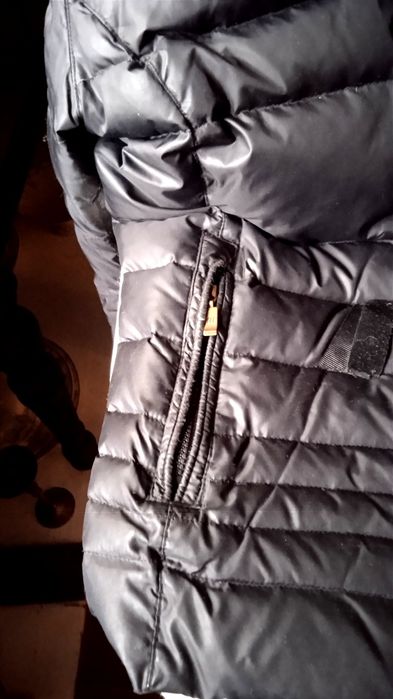 Женский пуховик Hetrego.