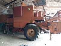 Kombajn Bizon Super Z056 z sieczkarnią, stołem do rzepaku