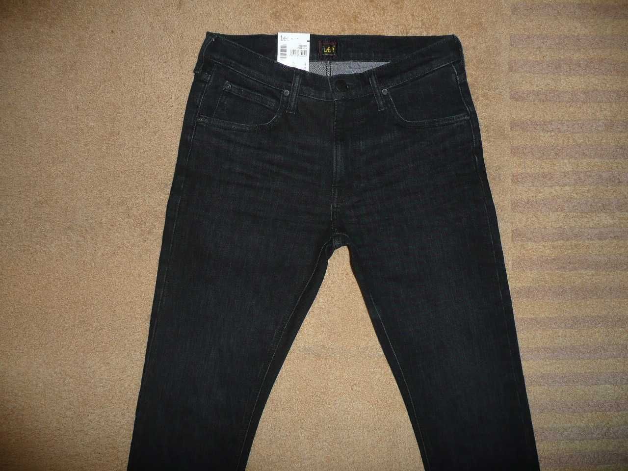 NOWE spodnie dżinsy LEE W30/L34=40/110cm jeansy LUKE