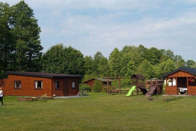 Domy całoroczne nad jeziorem z jacuzzi , sauna , wędkarstwo, mini zoo