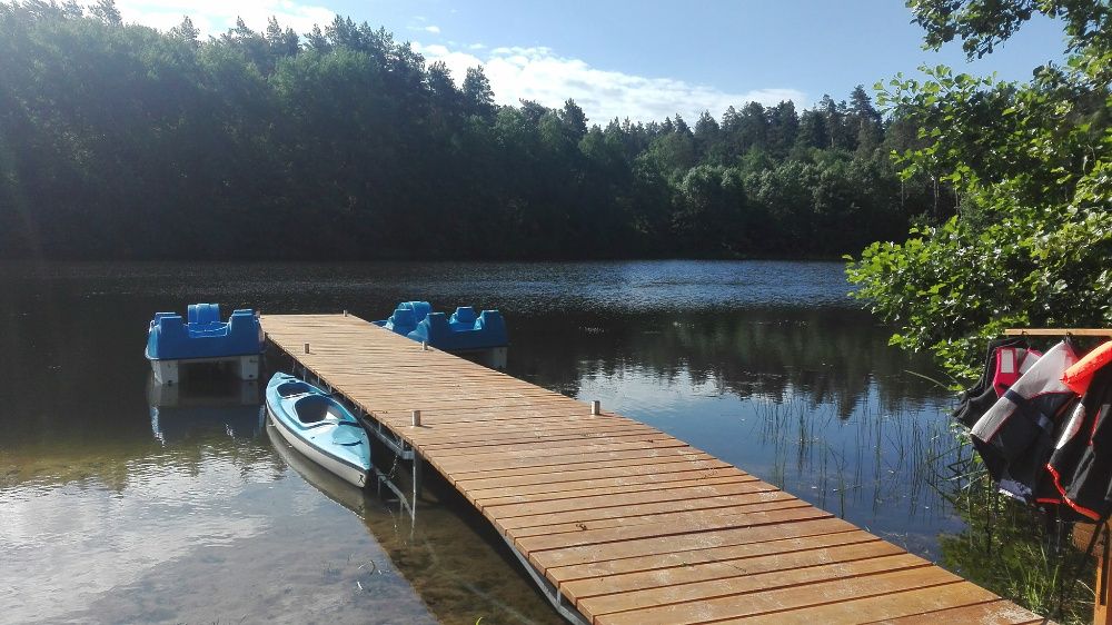 Domki nad prywatnym jeziorem z prywatną plażą-dostęp tylko dla wynajmu