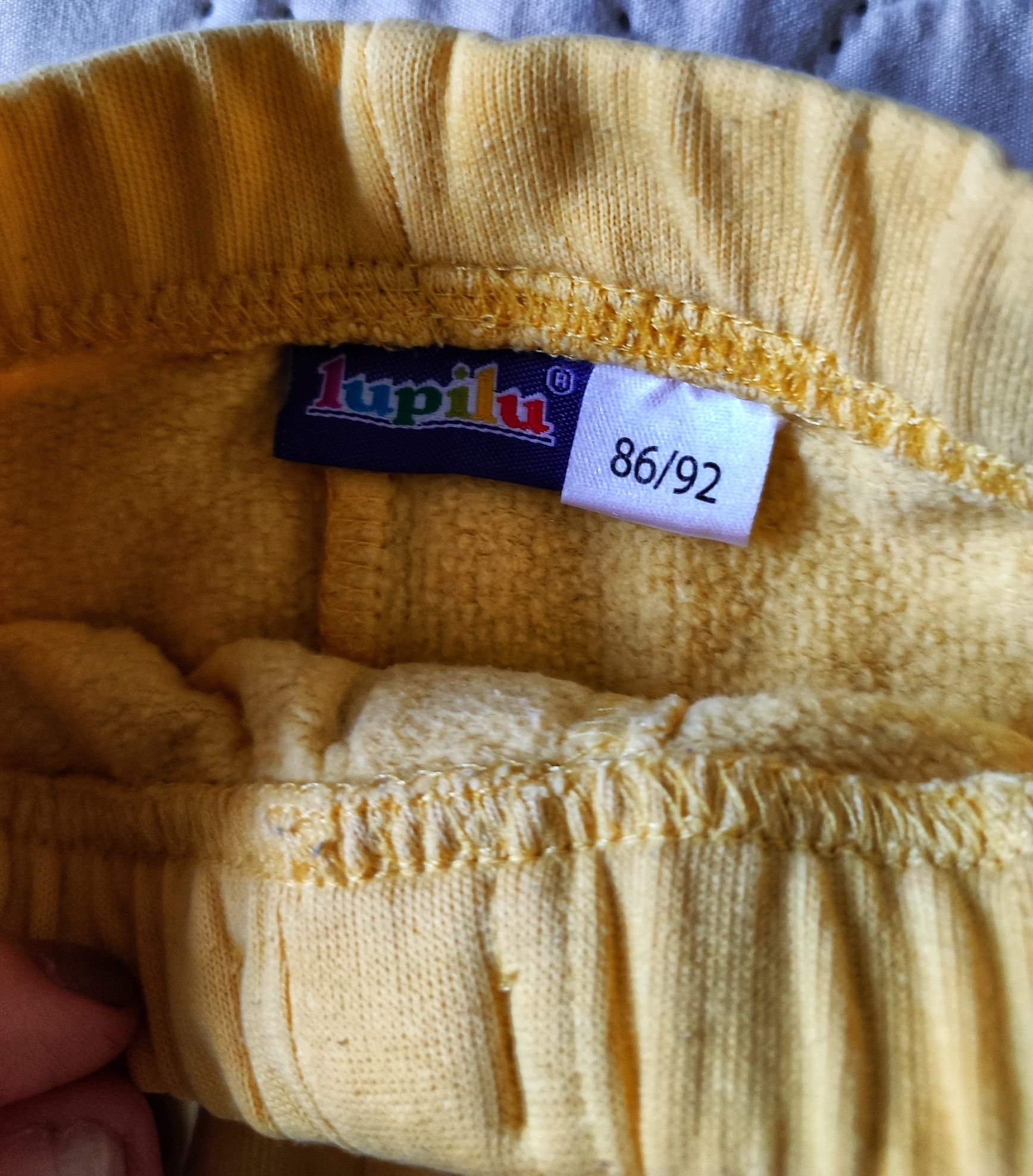 Spodnie dresowe żółte lupilu 86/92 modne