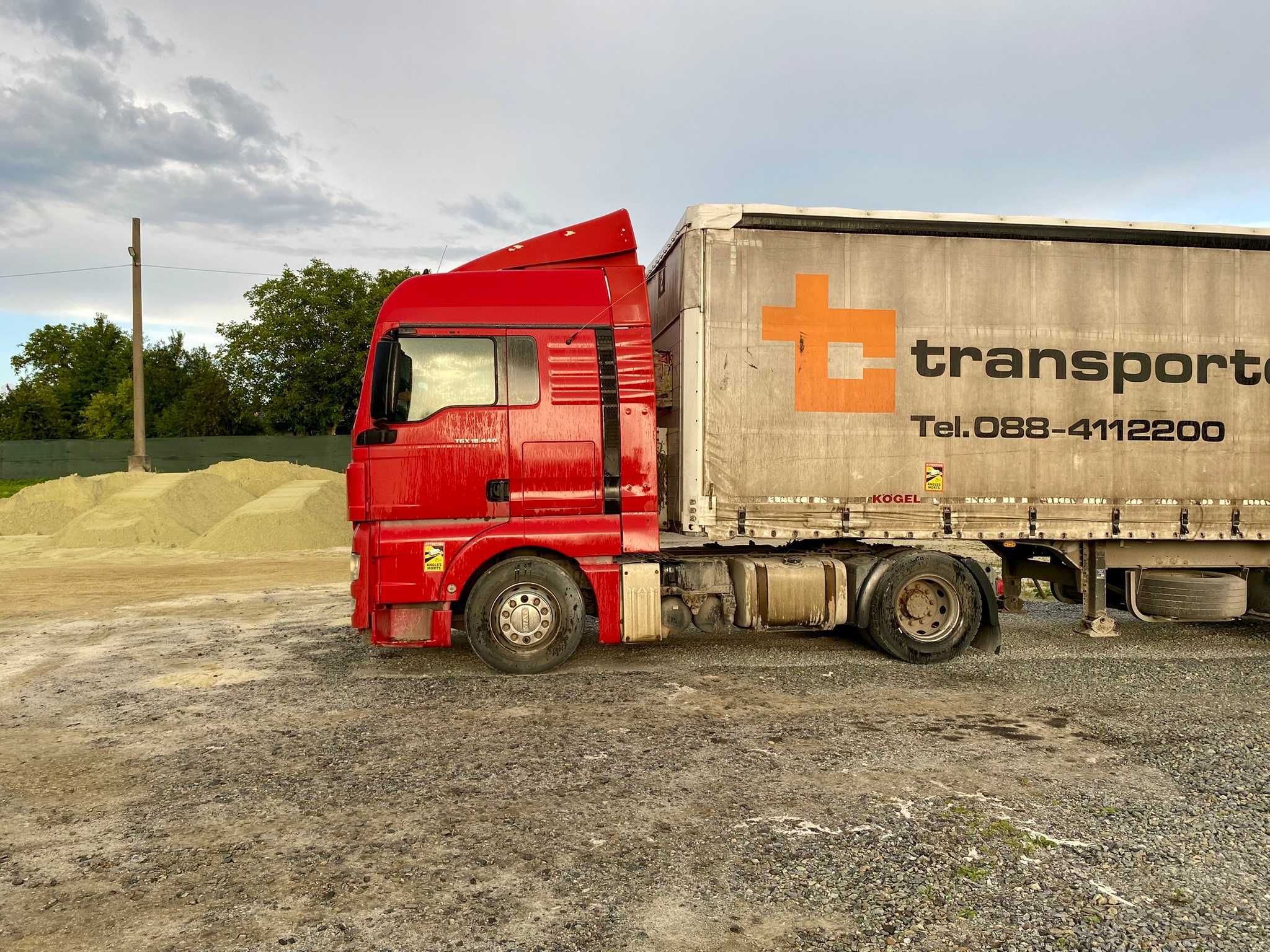 MAN TGX 2011, причіп Schmitz 2005