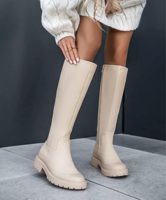 Продам новые сапоги