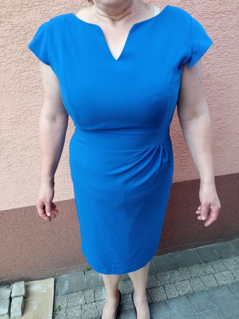 Niebieska elegancka sukienka 44