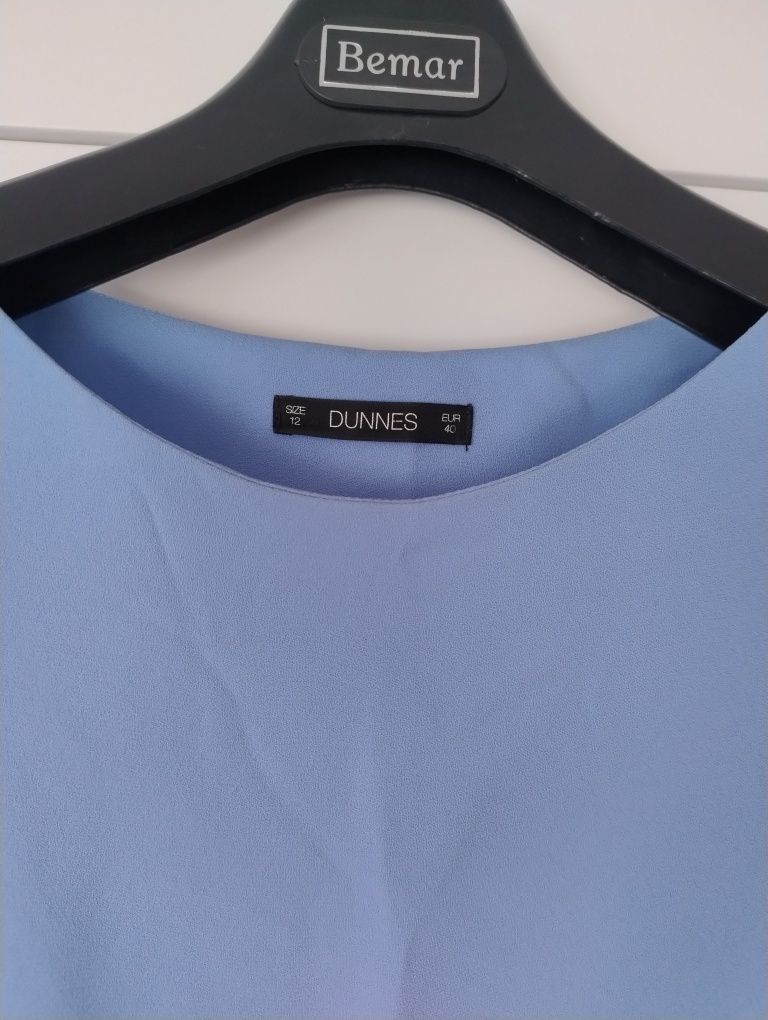 Elegancka błękitna bluzka z krótkim rękawem