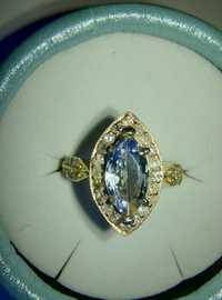 Złoty pierścionek z tanzanitem i diamentami  0,50ct